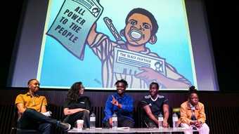 Photograph of five people in a panel discussion event at Tate