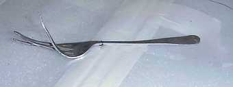 Fork, one of the objects from Cornelia Parker's installation Cold Dark Matter: An Exploded View
