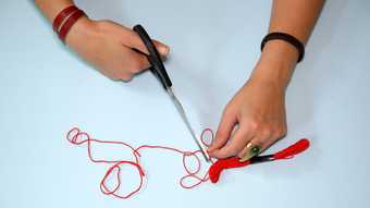 Photograph of making a friendship bracelet
