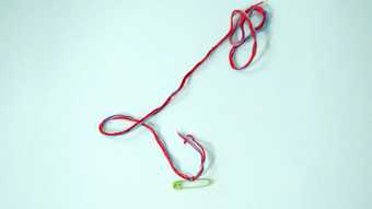 Photograph of making a friendship bracelet