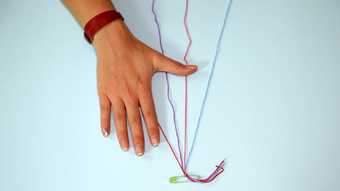 Photograph of bracelet making activity